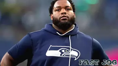 Seahawks RG Anthony Bradford exits OTAs with knee injury